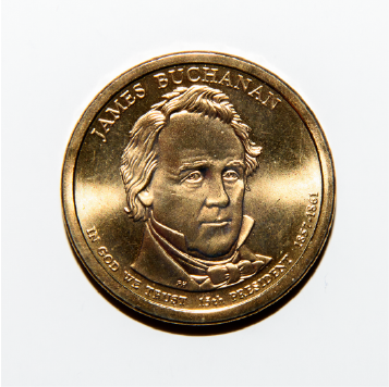 a golden coin with James Buchanan's face on it coin